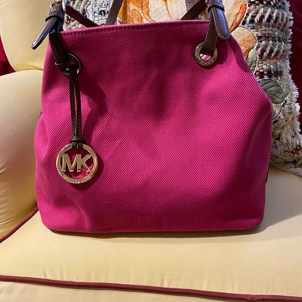 Michael Kors pink canvas purse, new never carried but I’ve had it about 3 years